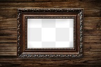 Vintage picture frame mockup on a wooden background 
