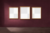 Wooden picture frame mockups hanging on a red wall
