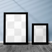 Black picture frame mockups against a blue wall