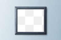 Bluish gray picture frame mockup hanging on a blue wall