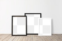 Black and white picture frame mockups on a wooden floor