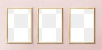 Wooden picture frame mockups hanging on a pink wall