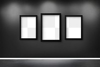 Black picture frame mockups hanging on  a black wall