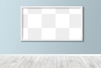 White picture frame mockup hanging on a light blue wall