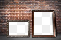 Blank vintage picture frame mockups leaning against a brick wall