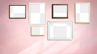 White and wooden picture frame mockups hanging on a pink wall