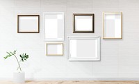 Blank picture frames mockup on an off white wall