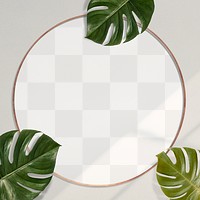 Gold round Monstera leaves on beige background