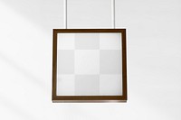 Brown framed sign mockup png hanging from the ceiling