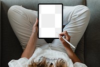 Woman using a stylus with a digital tablet during coronavirus quarantine at home transparent png