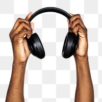 Headphones png in hand sticker on transparent background