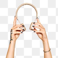 Headphones png in hand sticker on transparent background