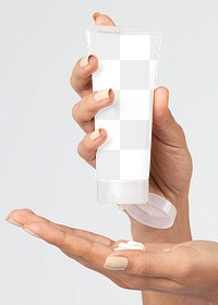 Woman holding a cream tube container mockup 