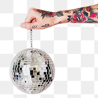 Tattooed hand holding Christmas glass ball transparent png