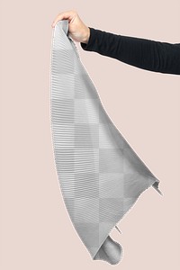 Png pleated scarf mockup in woman&rsquo;s hand studio shot