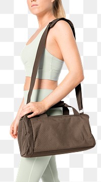 Png woman mockup carrying brown duffle bag in her gym clothes