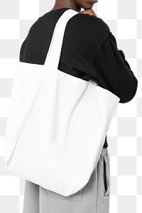 Png man mockup carrying white tote bag