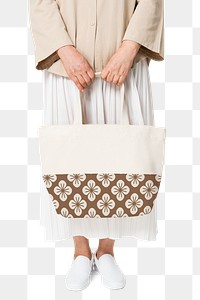 Png beige tote bag mockup with floral pattern for basic apparel shoot