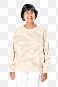 Floral beige sweater png mockup casual apparel on senior woman