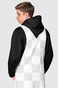 Png transparent dungarees mockup with black hoodie for street style shoot