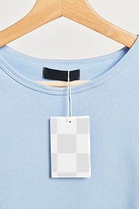 PNG clothing tag mockup on a wooden hanger