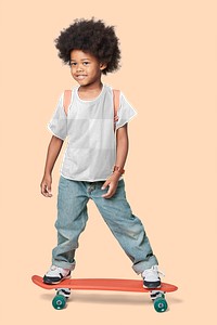 Boy wearing png tee mockup on a skateboard