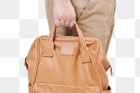 Png person holding brown leather backpack mockup