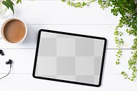 Tablet png screen mockup on plant parent table flat lay