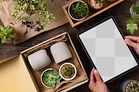 Tablet png screen mockup/screen mockup psd on plant parent table flat lay