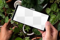 Phone png screen mockup in plant parent’s hand