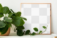 Png picture frame mockup next to jade pothos houseplants home decor
