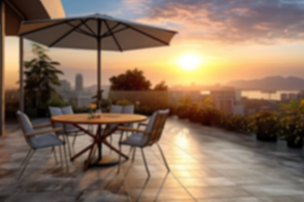 Editable blurred sunset over patio backdrop