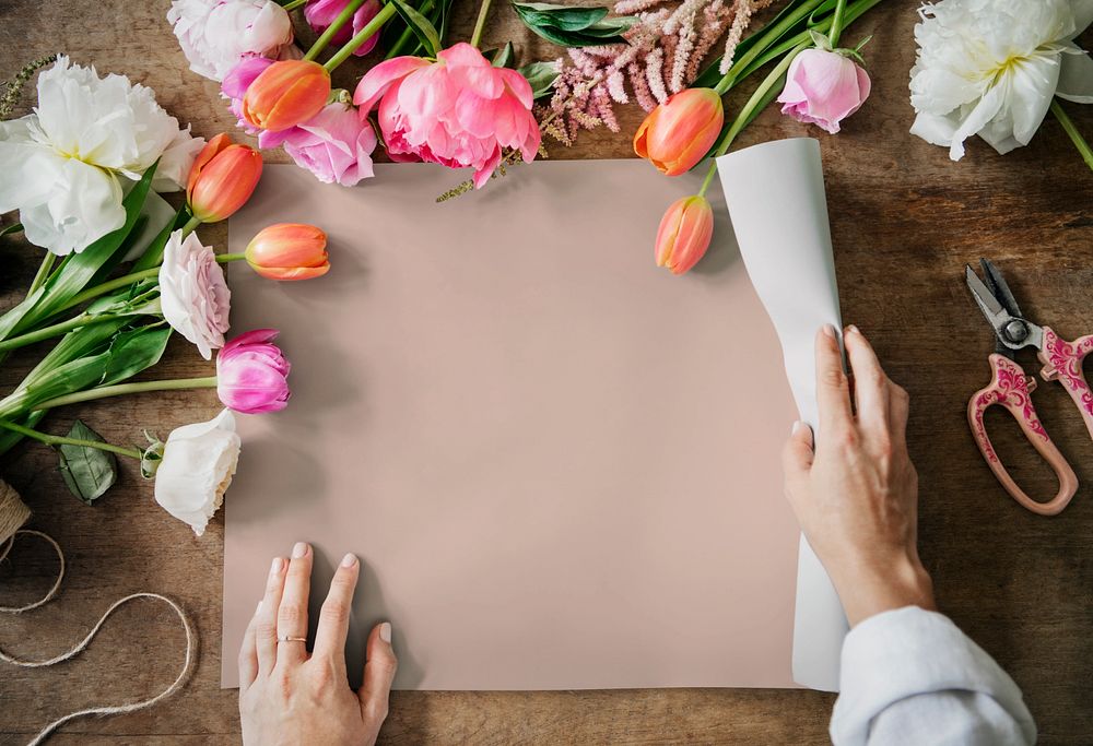 Wedding poster mockup among colorful flowers 