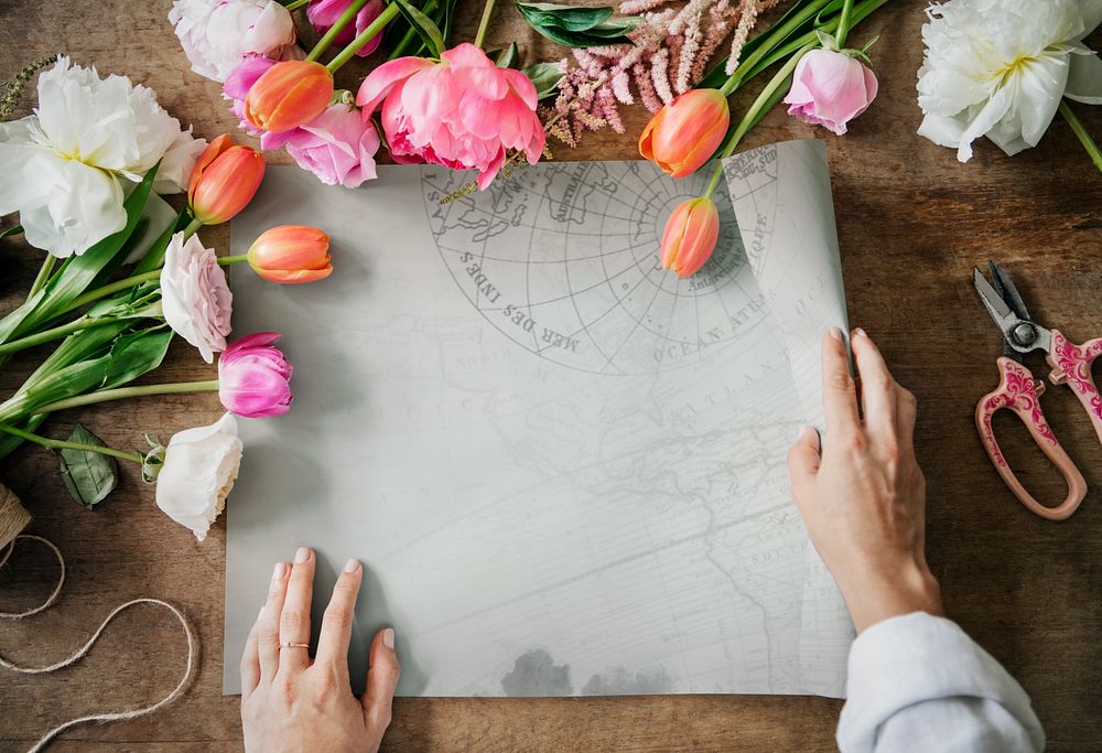 Wedding poster mockup among colorful flowers 