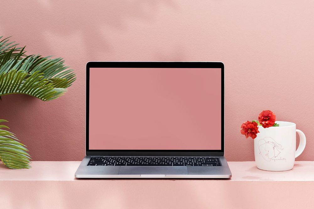 Laptop mockup, pink wall workspace 