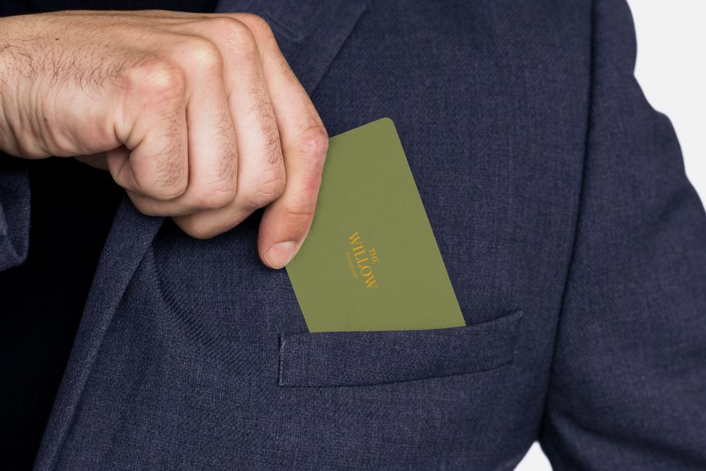 Business card mockup in businessman's pocket 