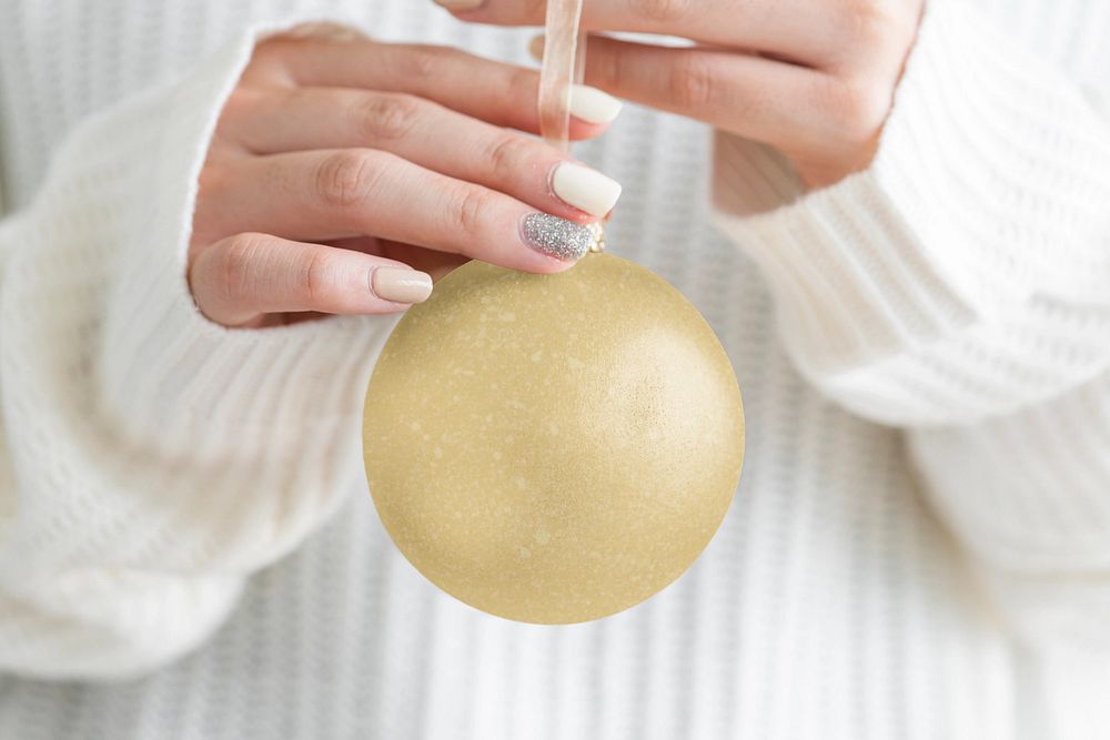 Bauble mockup, Christmas decoration, woman hands