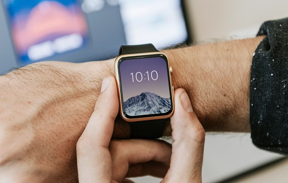 Man wearing smartwatch mockup, editable screen 