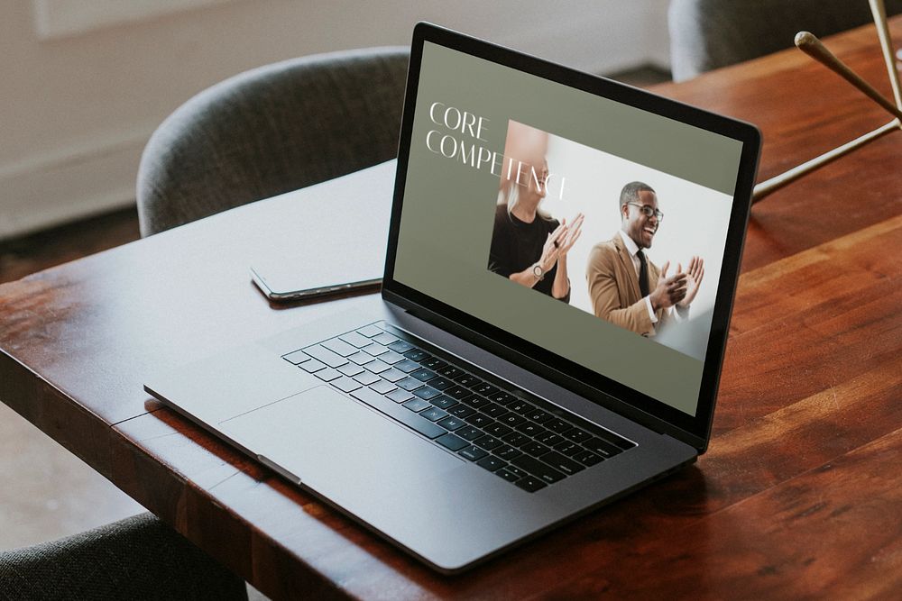 Laptop mockup, wooden table in meeting room 