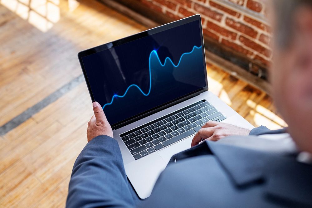 Laptop screen mockup, businessman working from home 