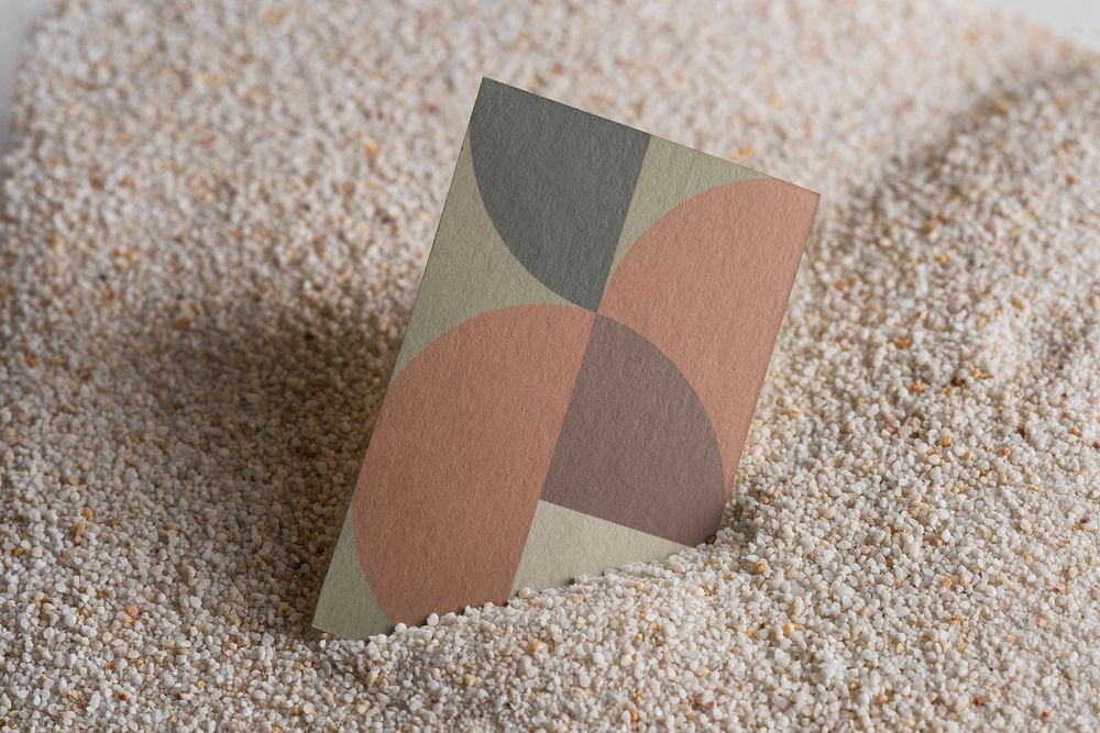 Business card editable mockup on sand