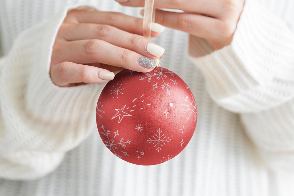 Bauble mockup, Christmas decoration, woman hands