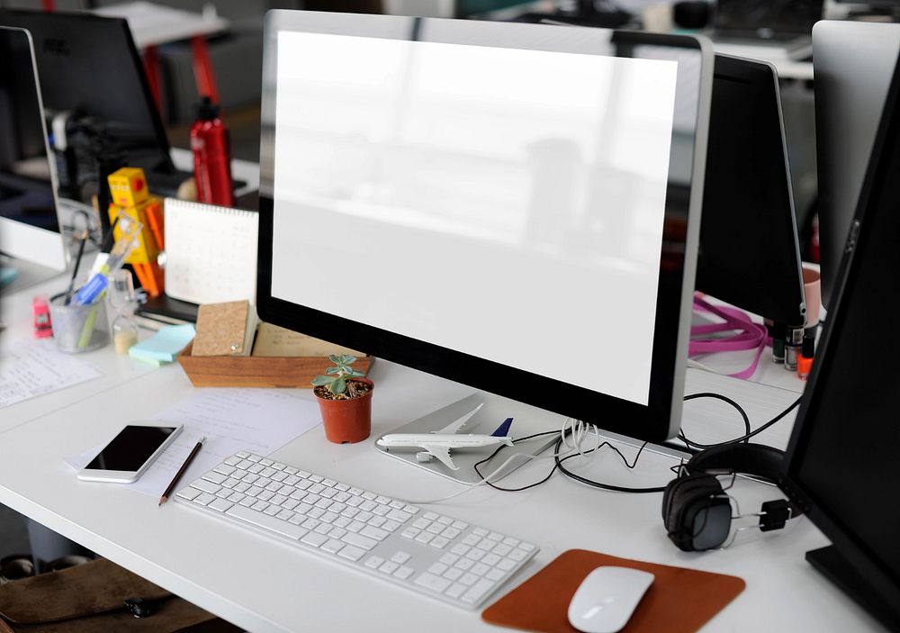 Computer screen mockup, desk setup, editable design