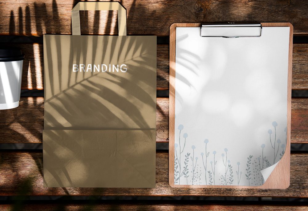 Branding mockup, editable clipboard and paper bag