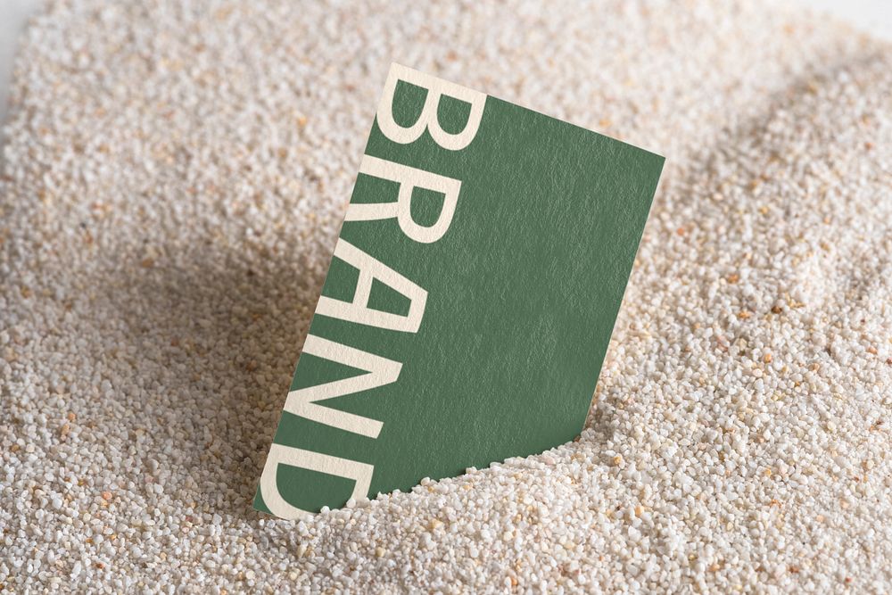 Business card mockup on sand, editable text