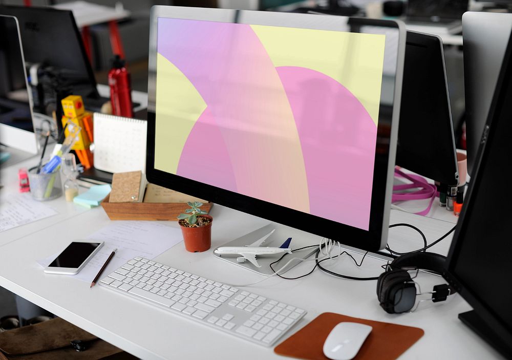 Computer screen mockup, desk setup, editable design