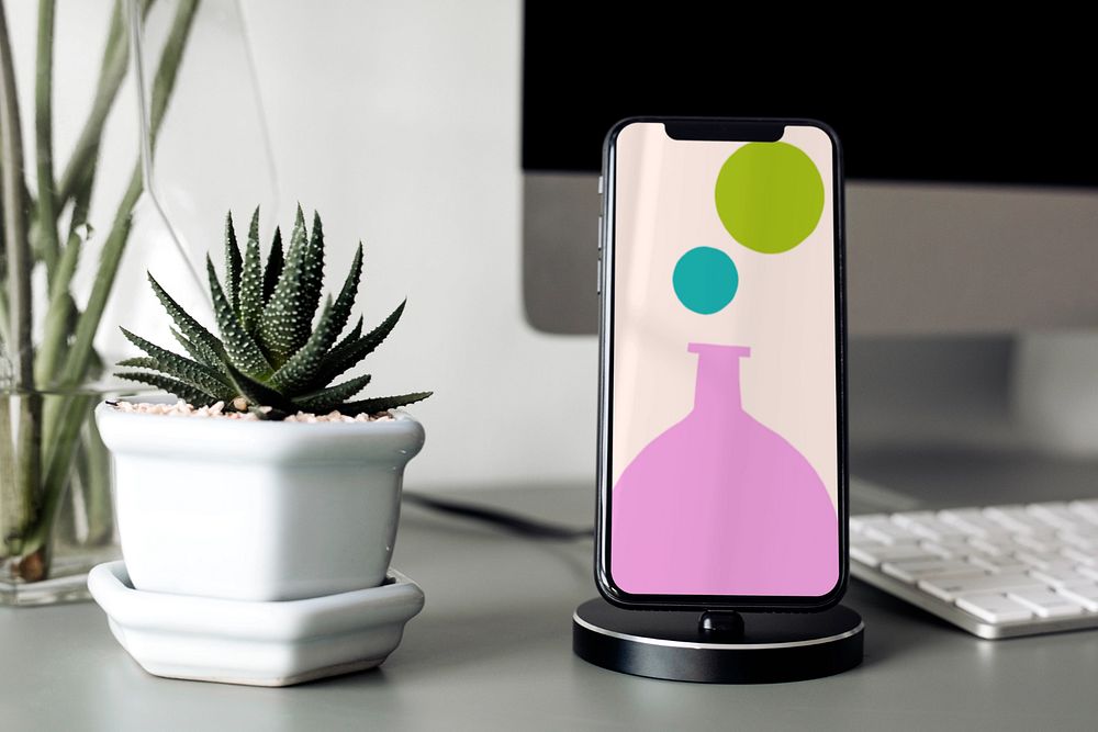 Smartphone screen mockup, desk setup, editable design