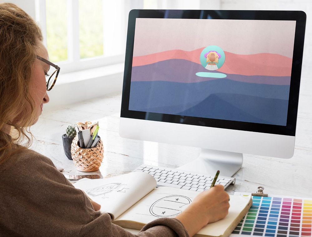 Graphic designer using computer mockup, customizable design