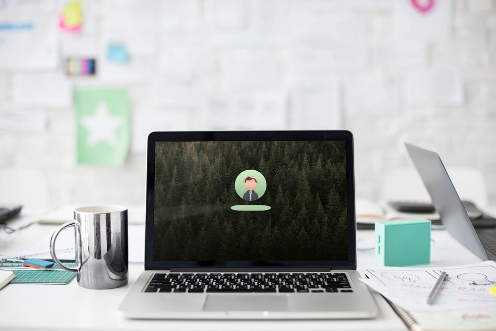 Laptop mockup on table, customizable notebook screen