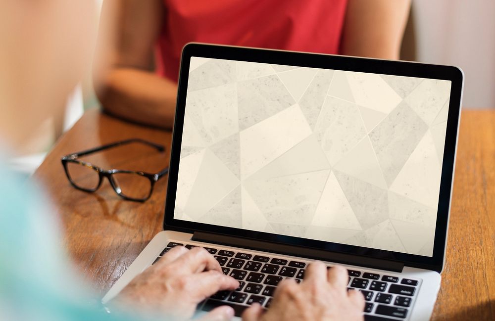 Woman using laptop mockup, editable screen